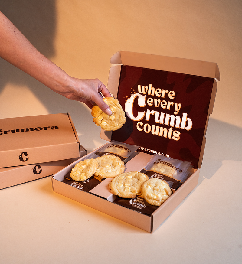 Crumora White Chocolate Cookie Box – soft baked cookies made with creamy Belgian white chocolate, UK delivery.